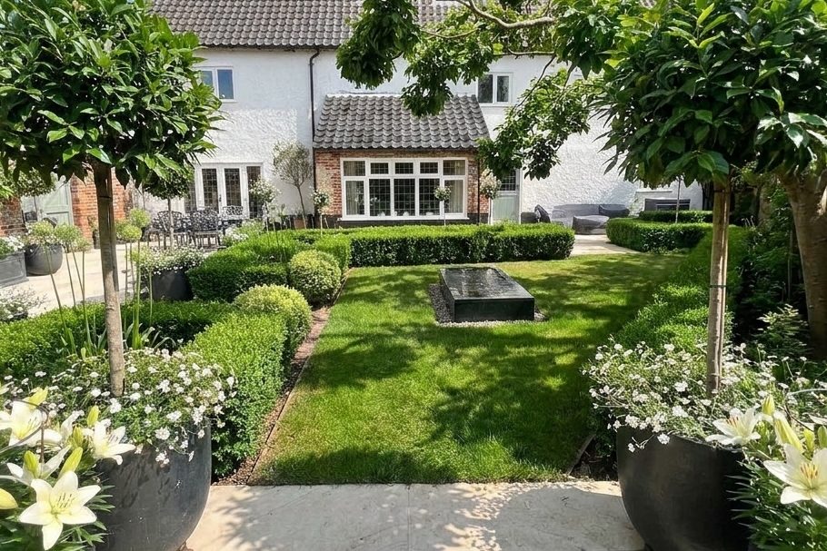 Stone patio beside a lawn
